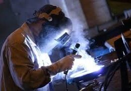 Worker carrying out welding operations